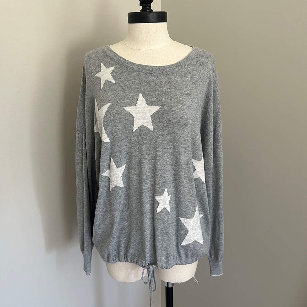Grey and silver star sweater in a UK size 16
